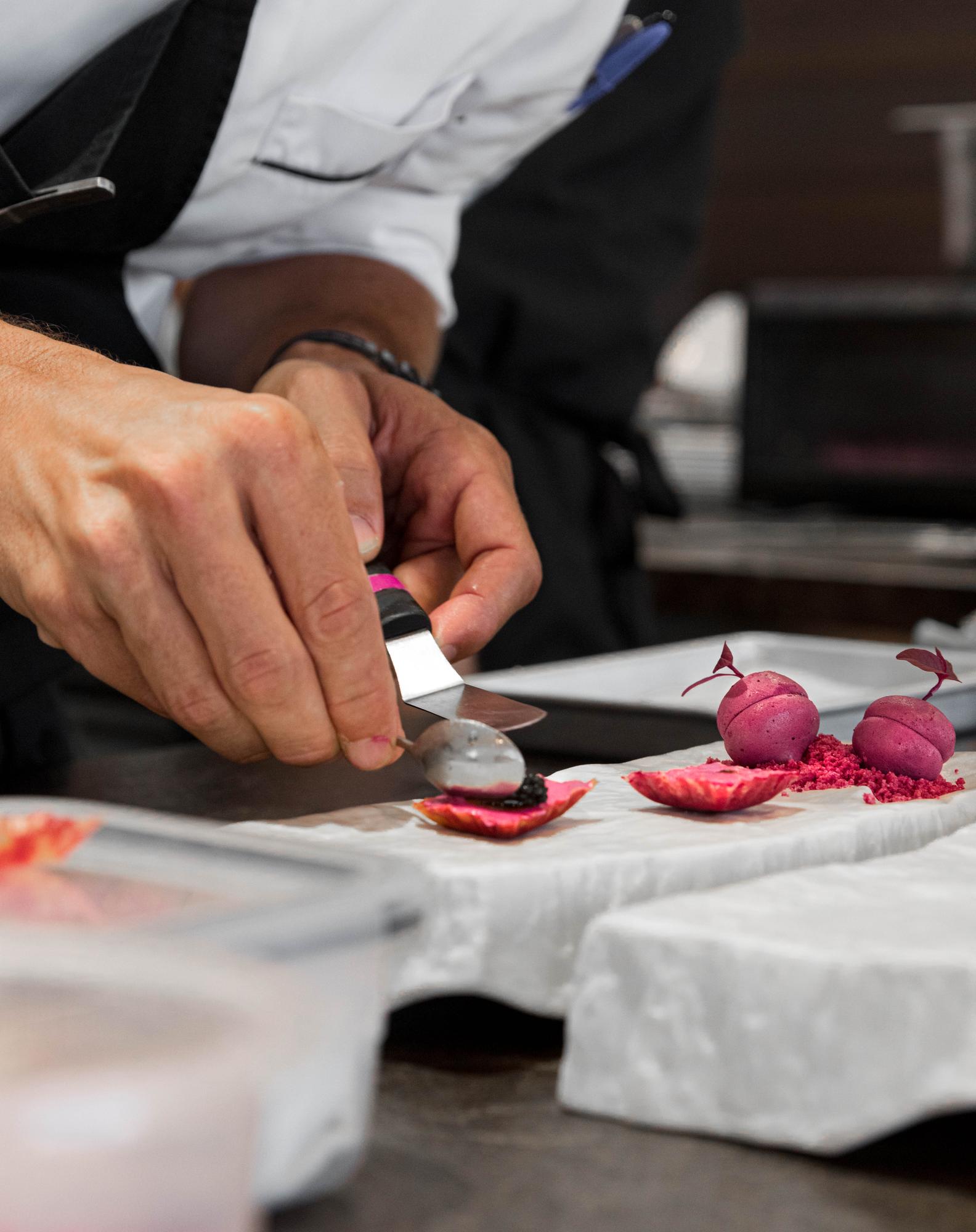 Chef demonstrating knife technique