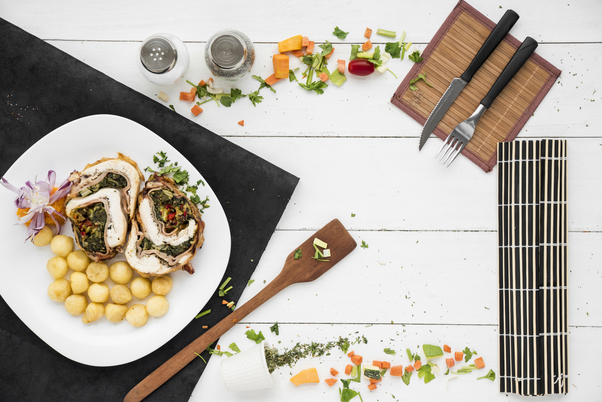 Plated three-course meal on rustic table